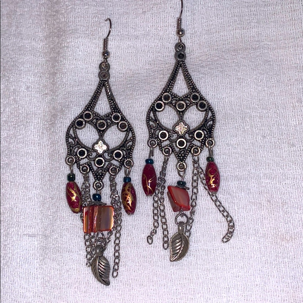 Red feather dangle earrings